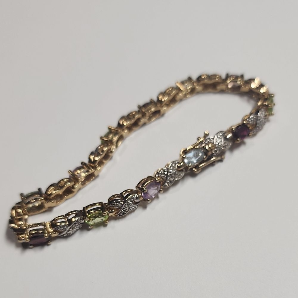 Sterling Silver Gemstone Bracelet Including Peridot, Garnet, Topaz, Amethyst